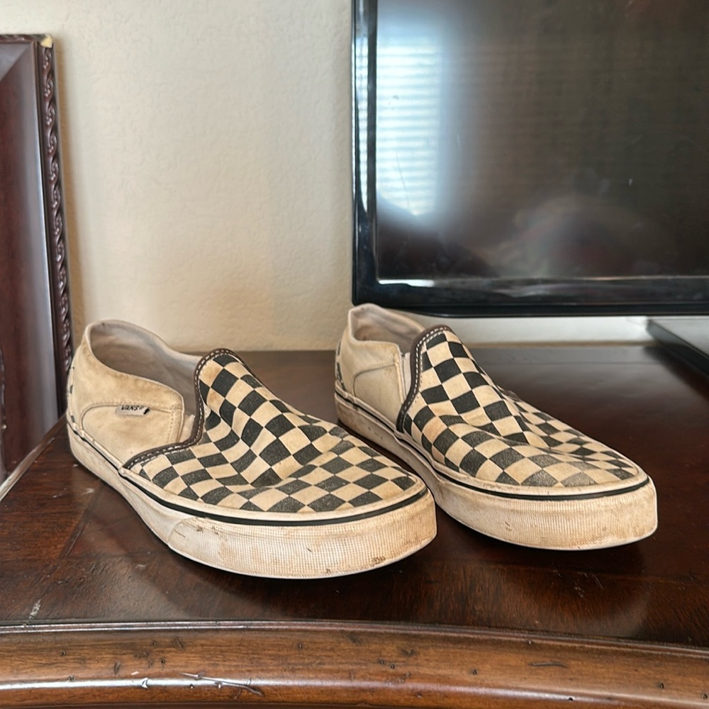 Very well loved checkered vans slip ons